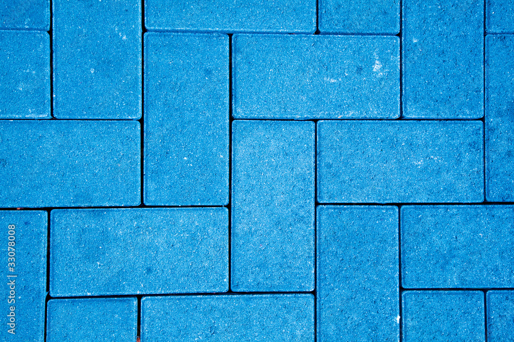 Naklejka premium pavement pattern made with cast concrete blocks in blue color