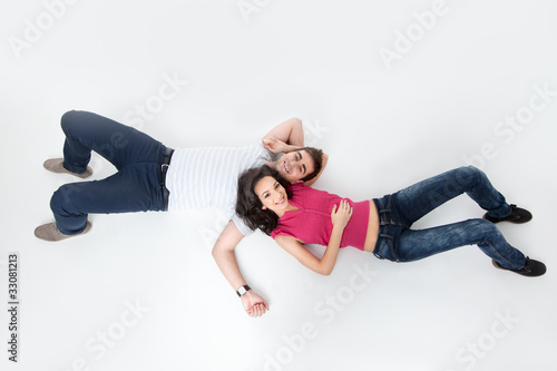 young couple in love smiling at camera