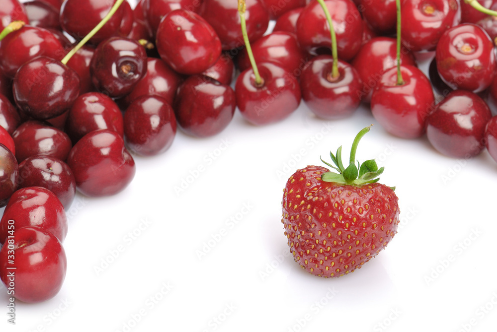 one strawberry and heap of cherries one strawberry and heap of cherries