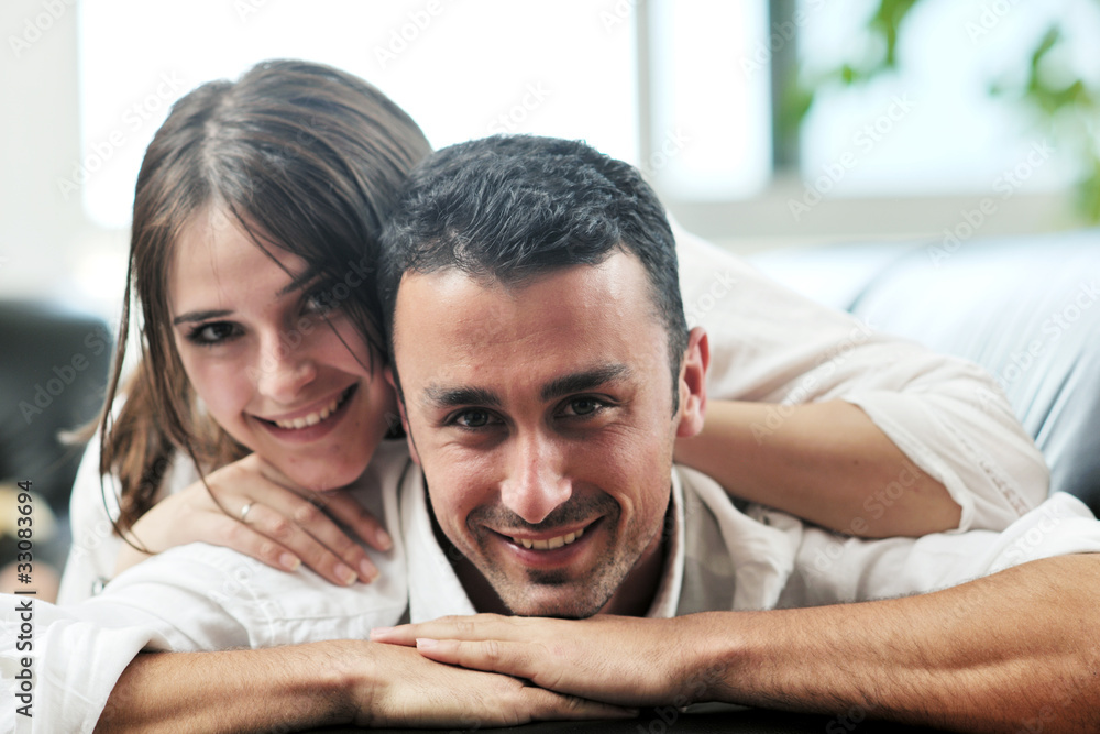 Fototapeta premium happy young couple relax at home