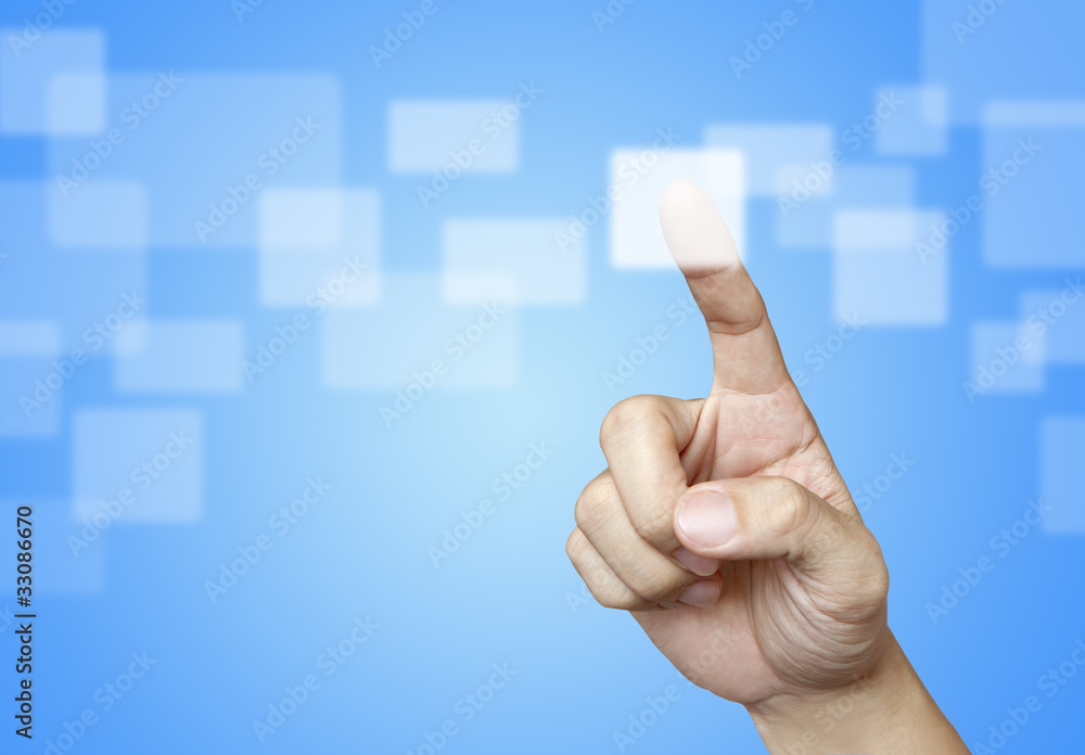 The hand press the button on blue background The hand press the button on blue background
