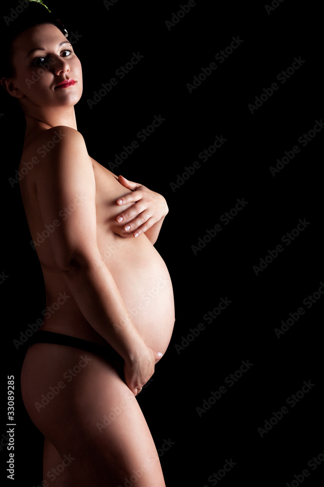 Naklejka premium Beautiful adult pregnant woman