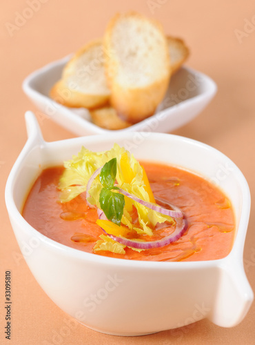 Vegetable cream soup and slices of a fried bread