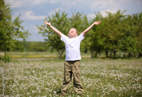 little boy playing in the park