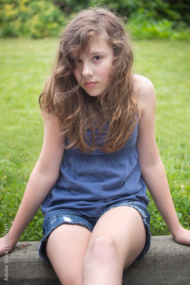 Shy Teenage Girl Stock Photo | Adobe Stock