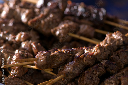 Barbecue shish kebab on metal grill