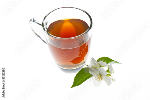 tea with jasmine flowers isolated on white