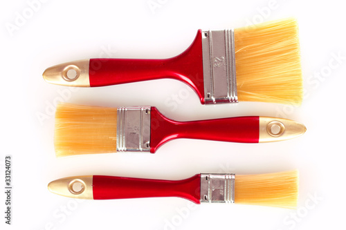 three brushes isolated on white