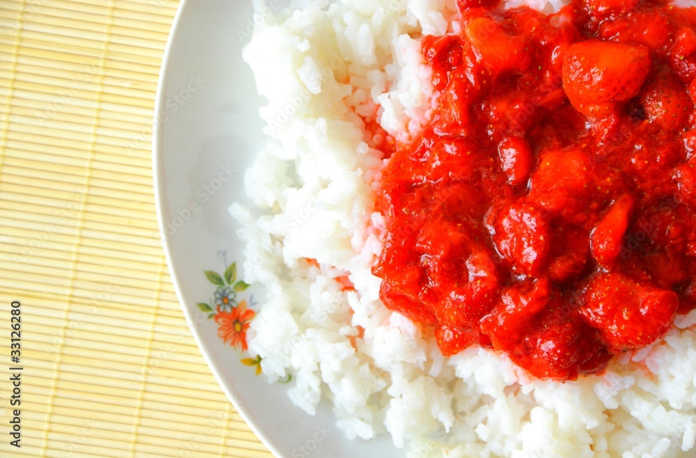 Tasty dish made from fresh crushed strawberries and rice