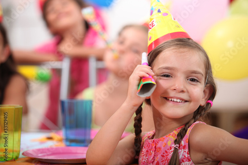 Young girl at a child's birthday party