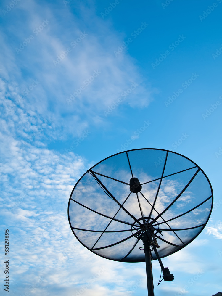 Satellite dish with blue sky on the background