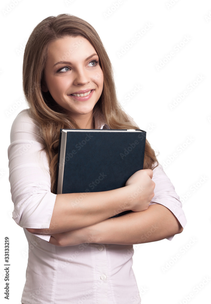 Attractive woman smiling while holding book Attractive woman smiling while holding book