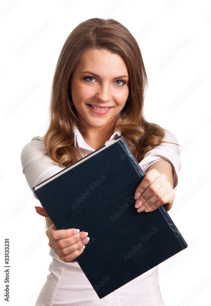 Attractive woman smiling while holding book Attractive woman smiling while holding book