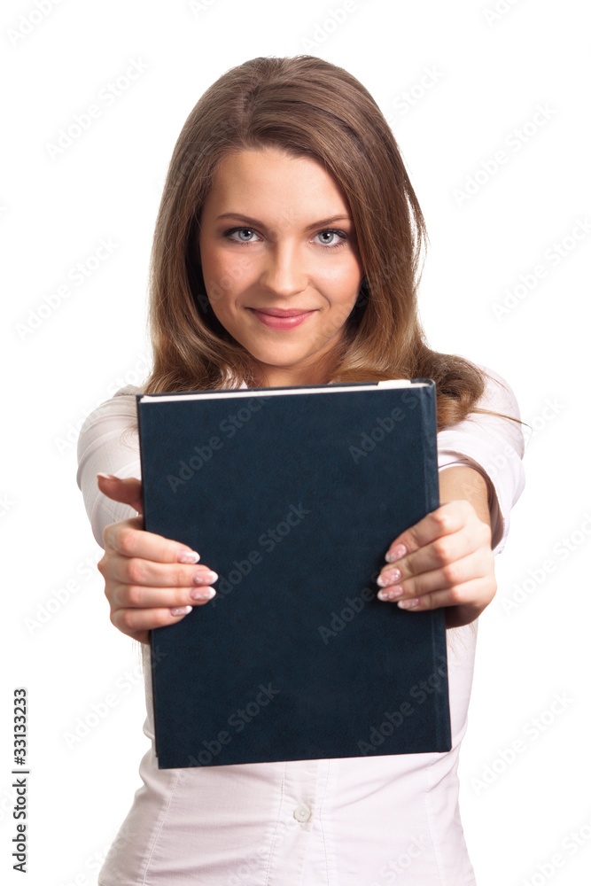 Attractive woman smiling while holding book Attractive woman smiling while holding book