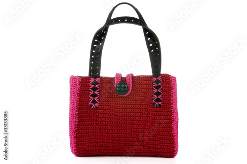 red knitted handbag isolated on white background.
