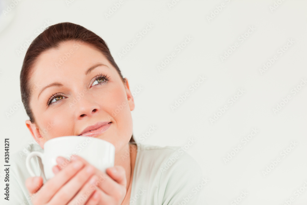 Good looking female posing while holding a bowl Good looking female posing while holding a bowl