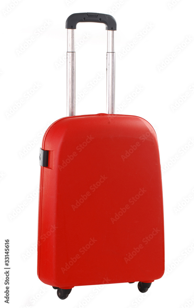 Red travel suitcase isolated on white Red travel suitcase isolated on white