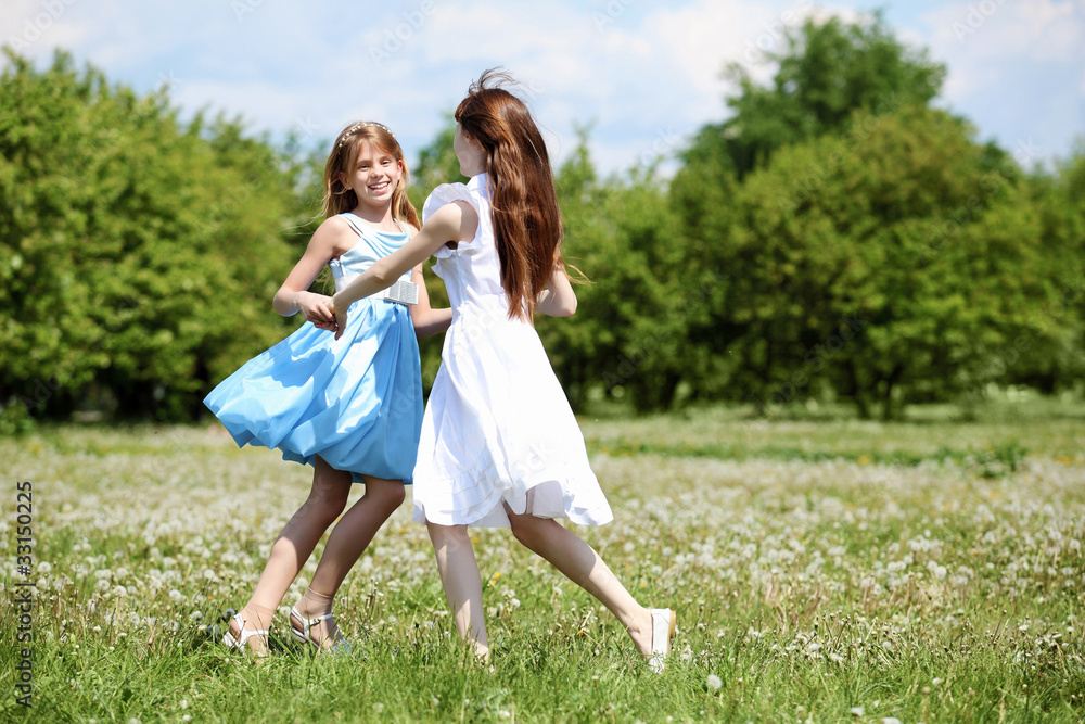 two girls playing in the park
