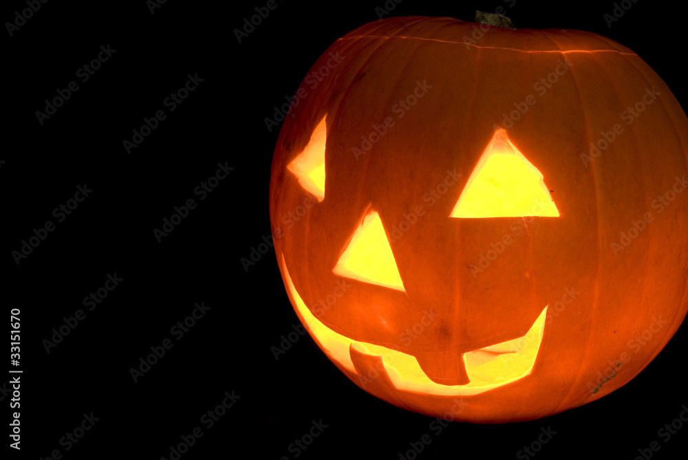 Halloween Pumpkin Head Carved Jack O Lantern, Cut Out on Black Halloween Pumpkin Head Carved Jack O Lantern, Cut Out on Black