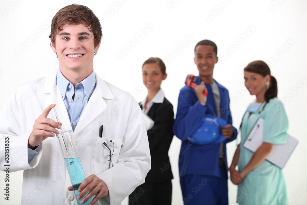 Portrait of a smiling chemist and different workers Portrait of a smiling chemist and different workers