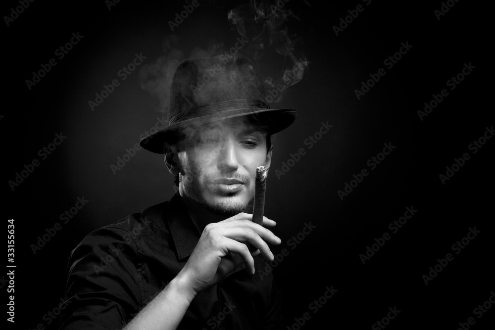 Man with hat and cigar in Black Man with hat and cigar in Black
