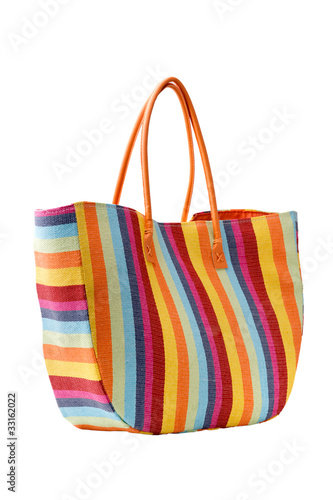 Colorful striped beach bag, isolated on a white background