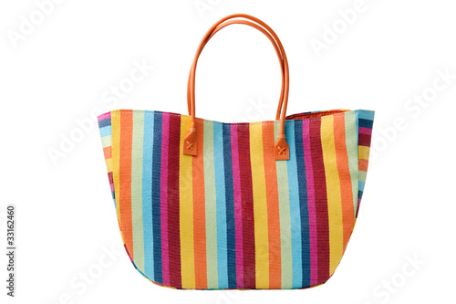 Colorful striped beach bag, isolated on a white background