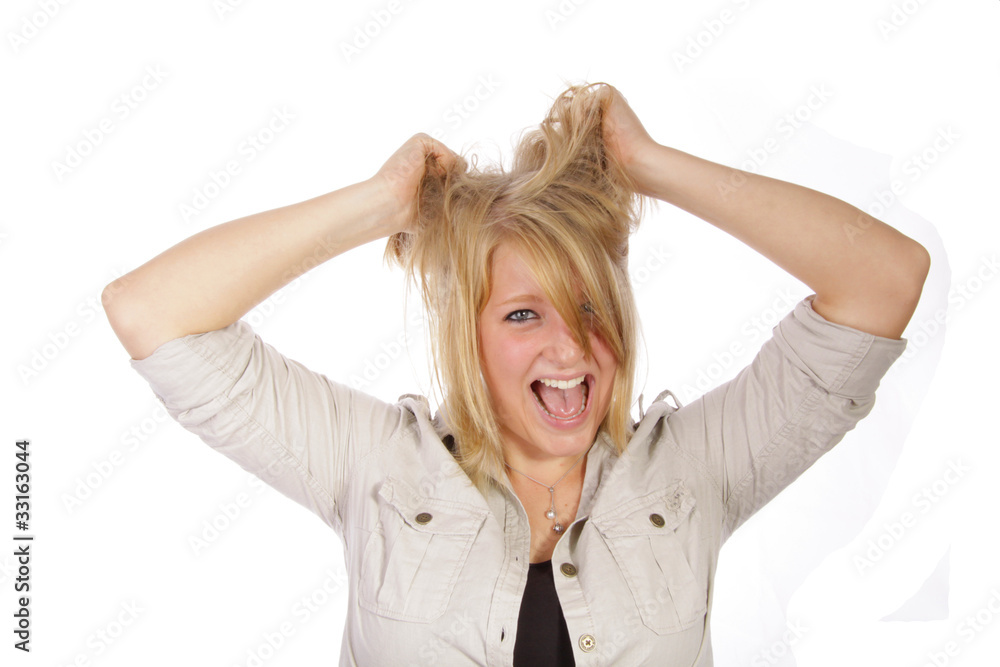 Junge Frau rauft sich die Haare Junge Frau rauft sich die Haare