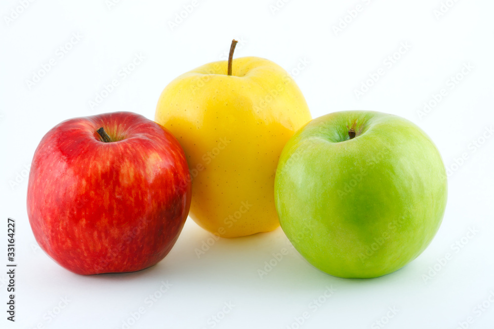 The red, yellow and green juicy fresh apples The red, yellow and green juicy fresh apples