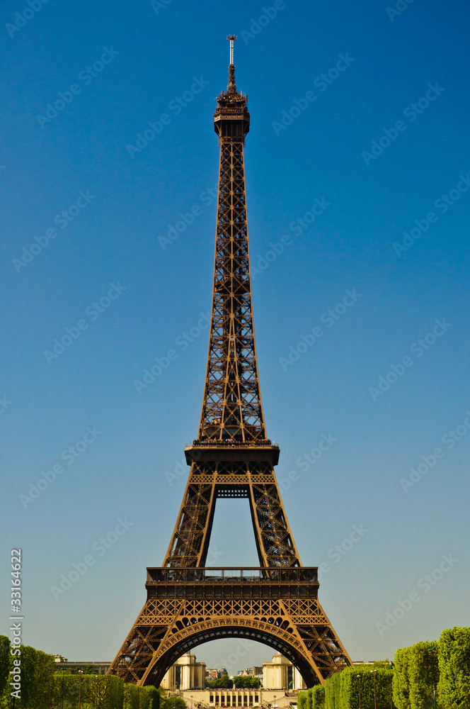 Eiffel Tower in portrait orientation with blue sky