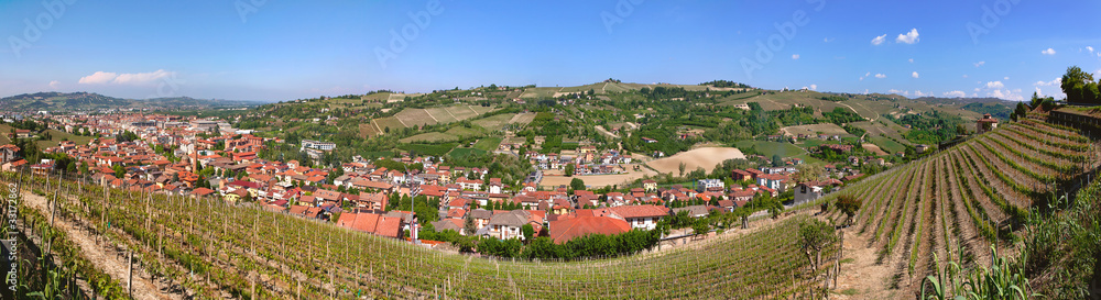 Panoramic view on hills and Alba, northern Italy.