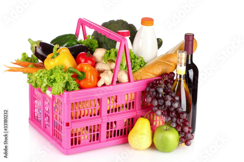 A set of vegetables in plastic basket isolated on white
