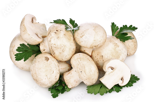 Champignon with parsley isolated on white
