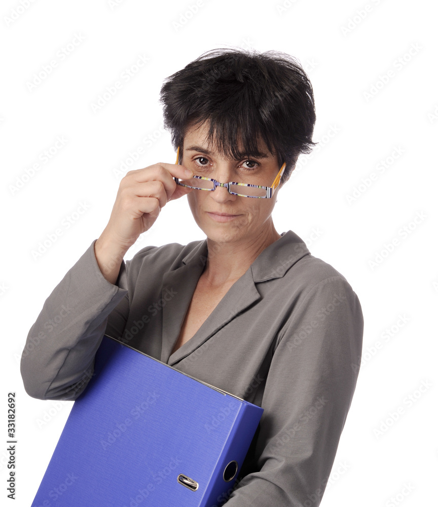 mature business woman looking over her glasses mature business woman looking over her glasses