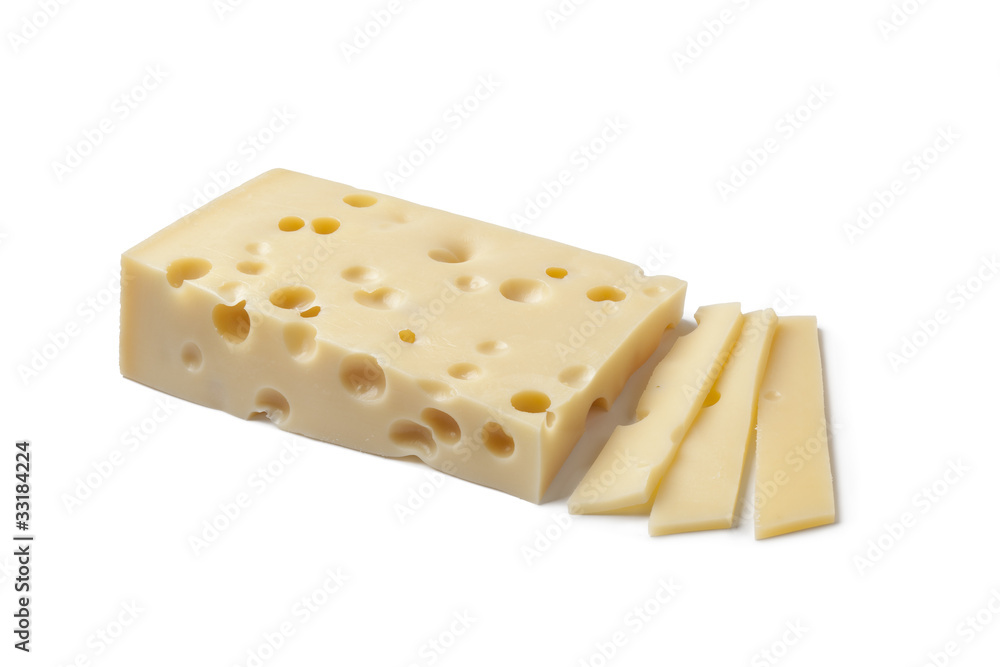Piece of Emmentaler cheese and slices Piece of Emmentaler cheese and slices