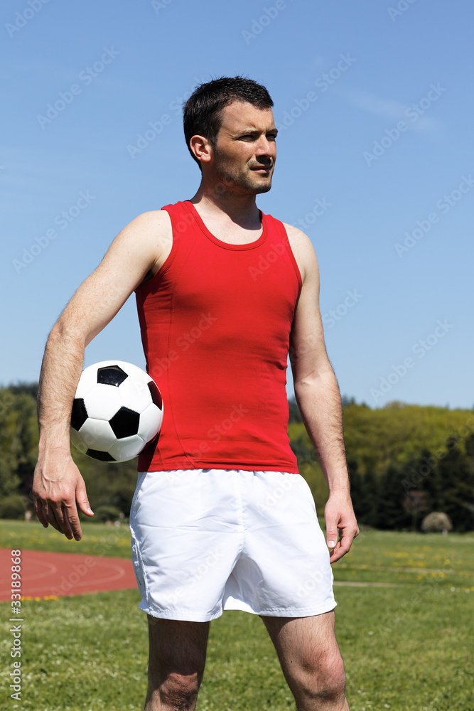 man with ball and blue sky in summer man with ball and blue sky in summer