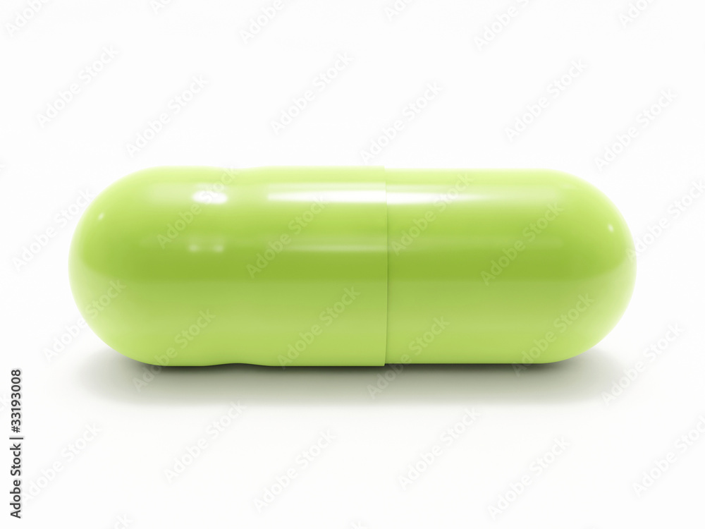 Green pill on white background, isolated