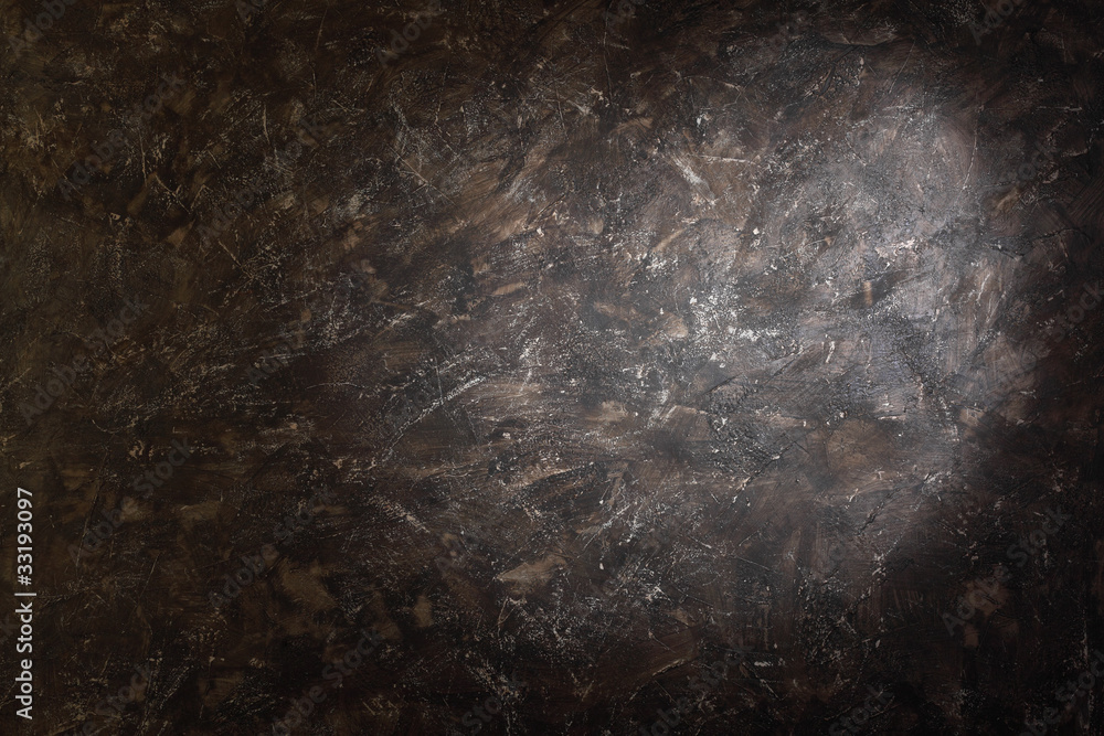 Splotch on dark brown background with spots inside studio Splotch on dark brown background with spots inside studio