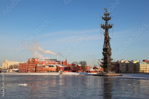Monument to Peter Great on Moskva river and factory