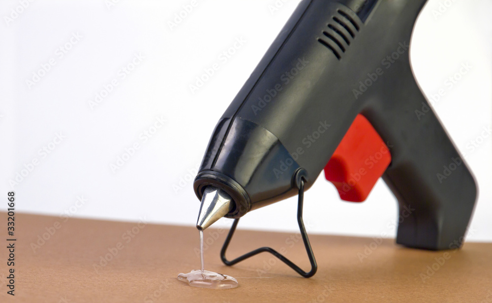 hot-glue-gun-with-glue-dripping-adobe-stock