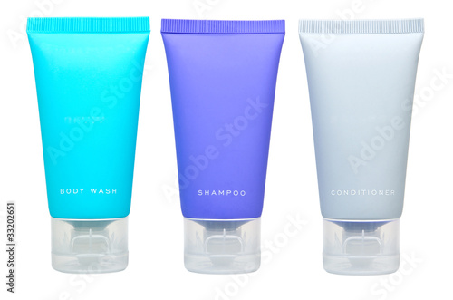 Body lotion, shampoo and conditioner in tubes isolated on white