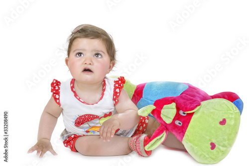 Niña con peluche.