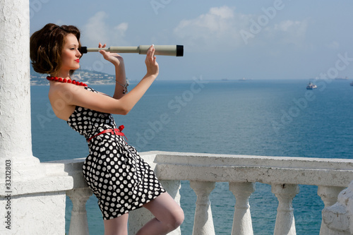 Girl with spyglass