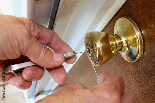 Locksmith Picking a lock