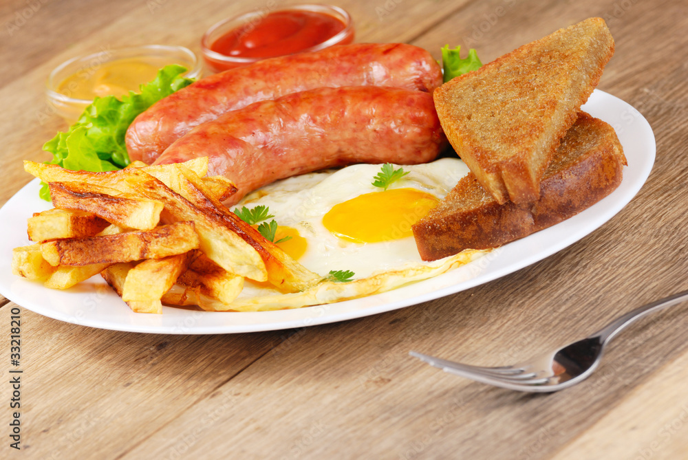 Fried eggs with sausages Fried eggs with sausages