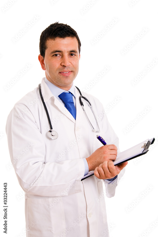 Portrait of a smiling young medical doctor writing down notes in Portrait of a smiling young medical doctor writing down notes in