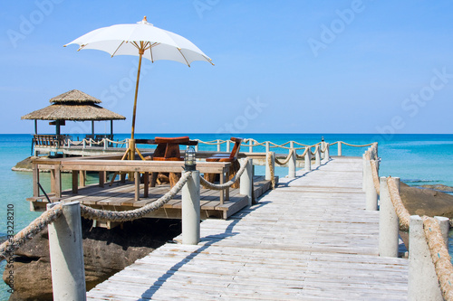 Wooden Pier In Tropical Paradise