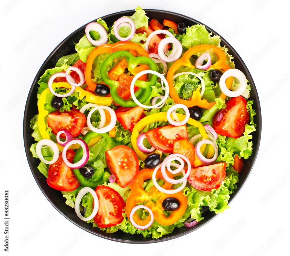 many vegetables in a pan isolated on white many vegetables in a pan isolated on white