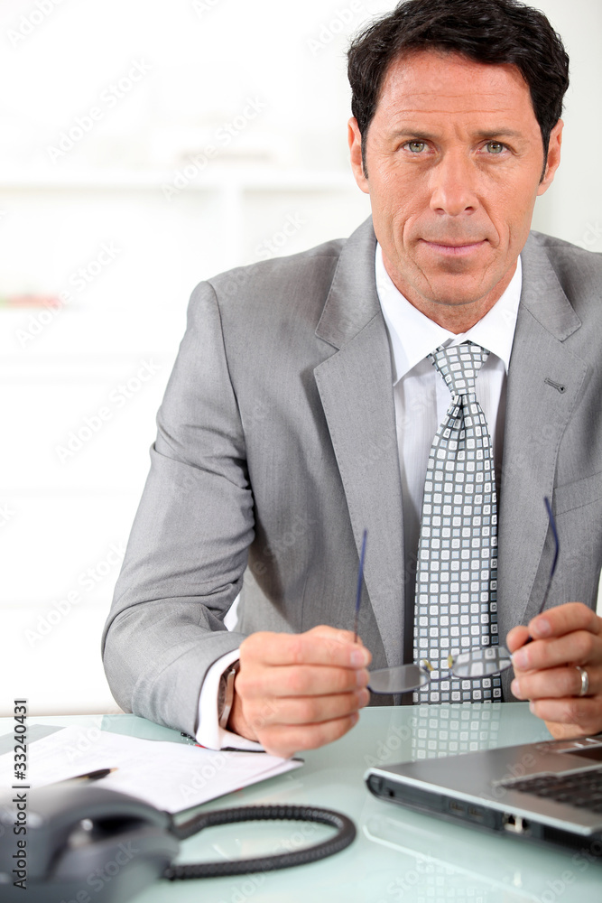 businessman at desk businessman at desk