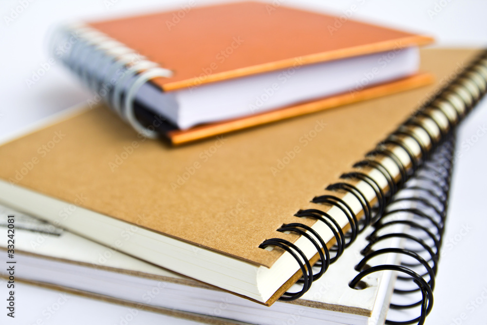 some notebooks with soft shadow on white background some notebooks with soft shadow on white background